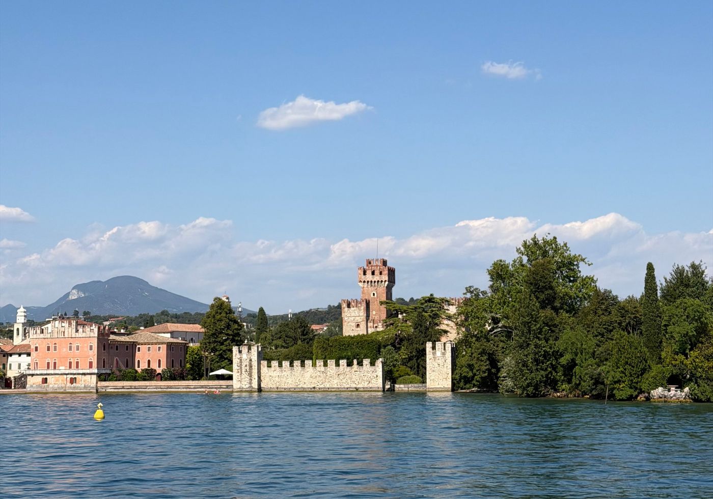 The castle walls of Lazise seen from the ferry